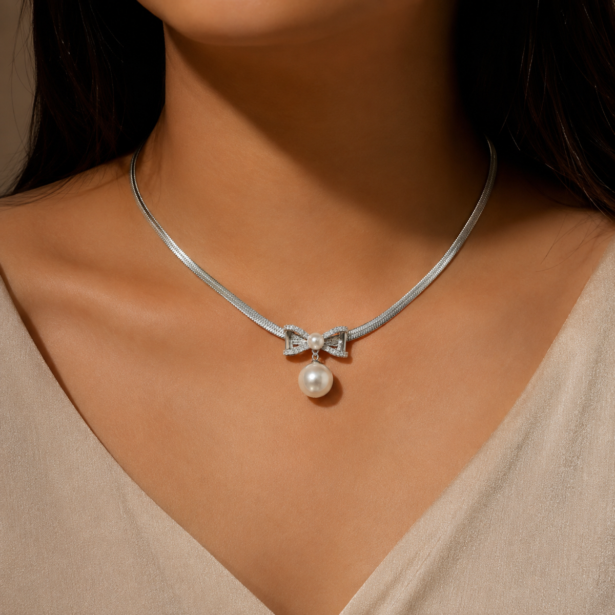 Stainless Steel Pearl & Bow Pendant Necklace