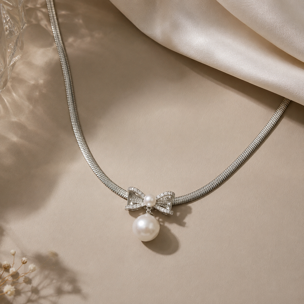 Stainless Steel Pearl & Bow Pendant Necklace